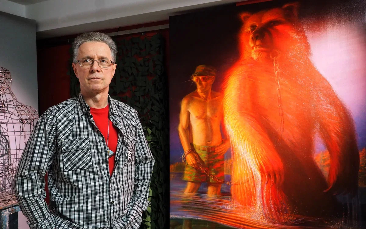 Photo: Vadim Grigoryev-Bashun in front of his painting Bathing of the Red Bear at the Erarta Museum, 1 April 2023. Photo: Alexander Chizhenok / Kommersant / Sipa USA / Vida Press