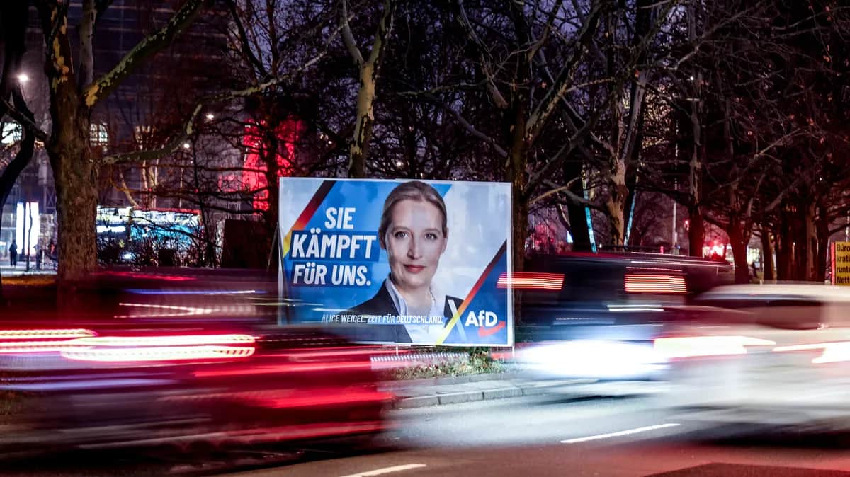 A campaign poster for the far-right party Alternative for Germany (AFD) featuring its candidate for chancellor, Alice Weidel, and reading “She fights for us”, in Berlin, Germany, 17 January 2025. Photo: EPA-EFE / FILIP SINGER