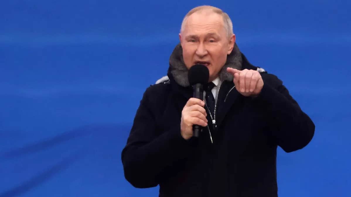 Владимир Путин выступает с речью на концерте в Лужниках 22 февраля 2023 года. Фото: Contributor / Getty Images