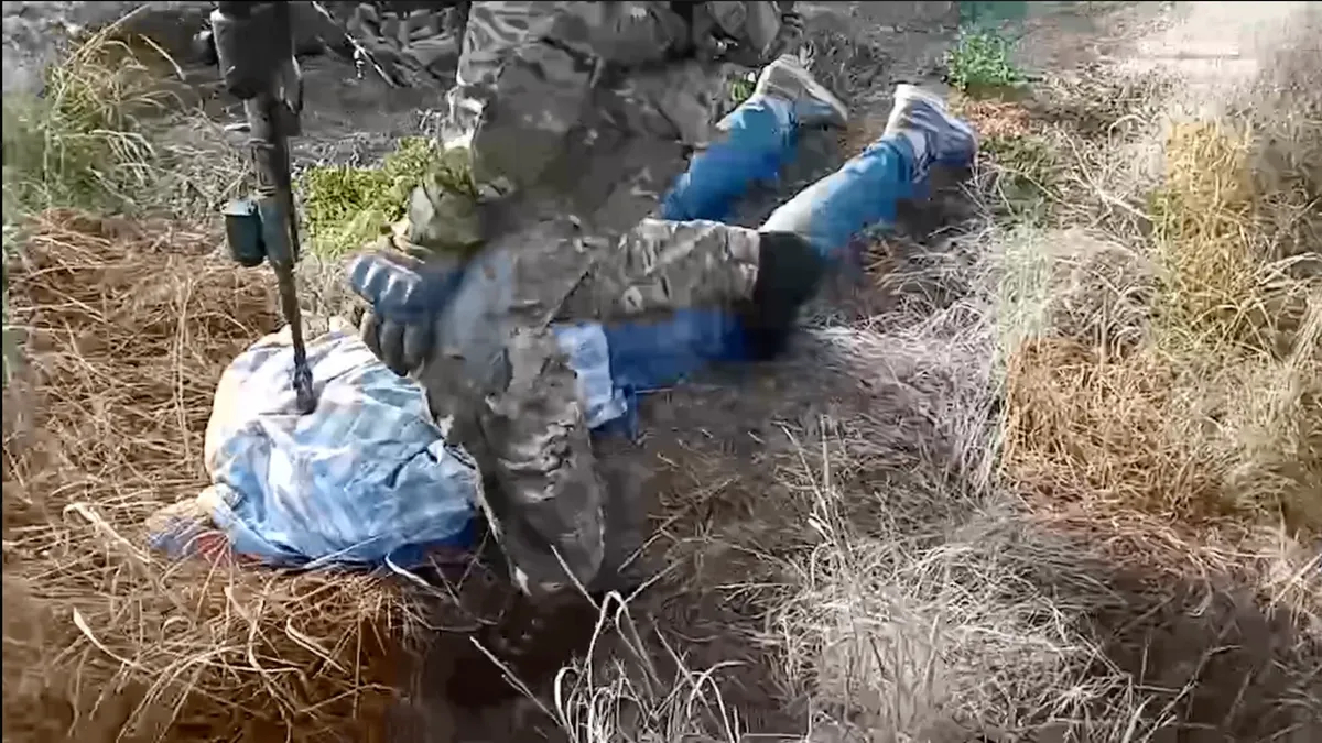 Скриншот видео телеграм-канала «Военные преступники»