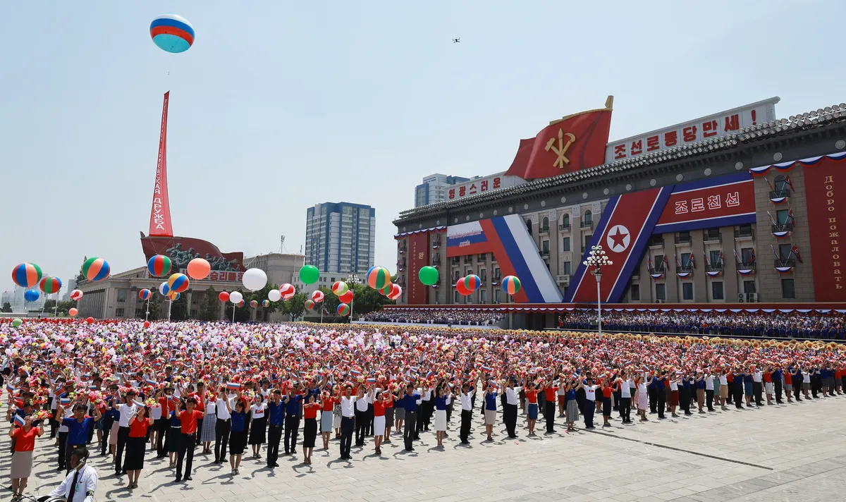 Thousands of North Koreans at a welcome ceremony for Putin in Pyongyang, North Korea, 19 June 2024. Photo: EPA-EFE / VLADIMIR SMIRNOV / SPUTNIK / KREMLIN POOL