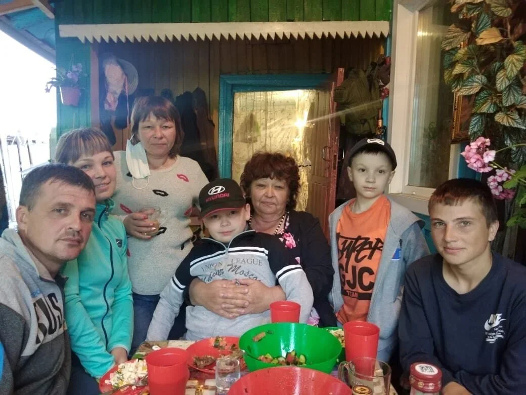Alexey (on the right) and his family. A photo from the family archive