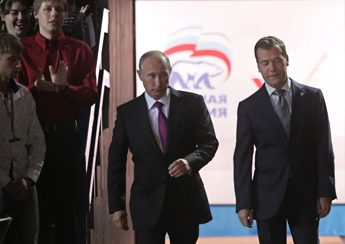 Putin and Medvedev at the 2011 United Russia congress at which Medvedev announced he supported Putin’s return to the presidency and confirmed he would gladly serve as prime minister. Photo: EPA / SERGEI CHIRIKOV