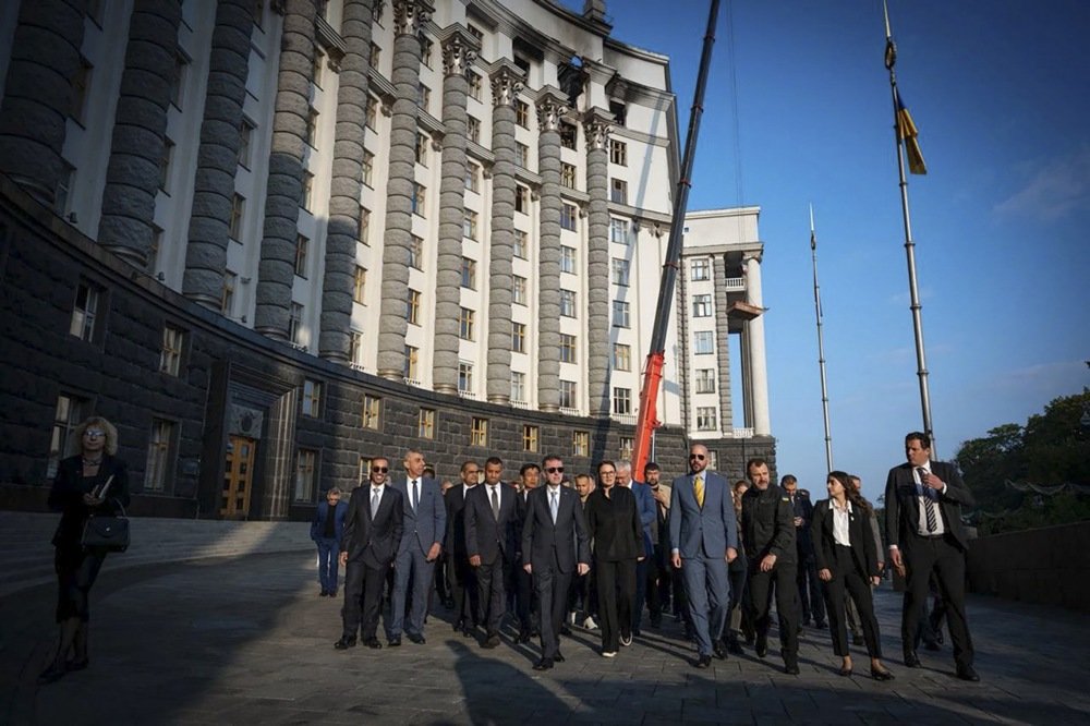 Foreign diplomats inspect the damage done to the Cabinet of Ministers building in Kyiv, 8 September 2025. Photo: EPA