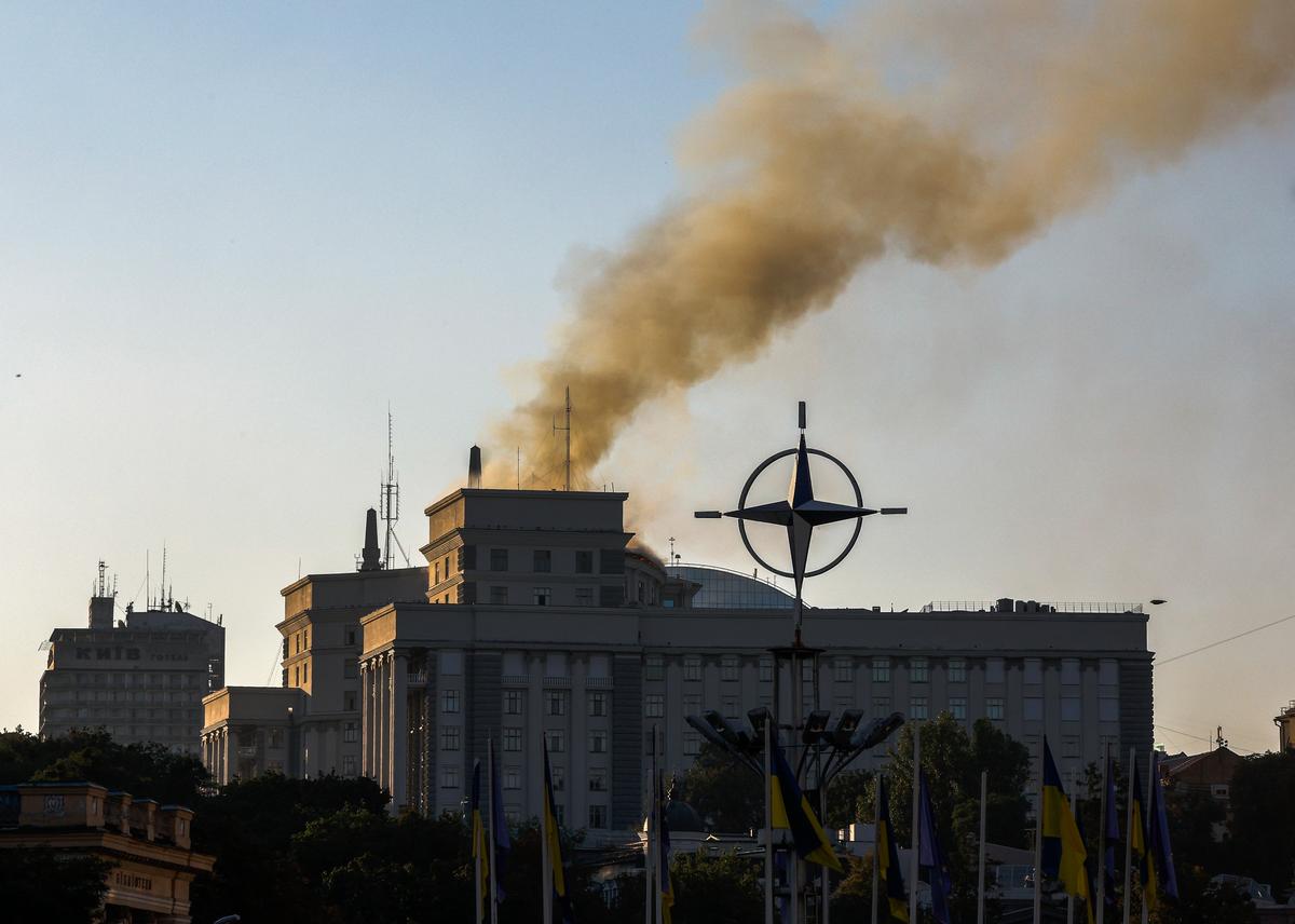 Smoke rises over Ukraine’s Cabinet of Ministers building in central Kyiv following a Russian drone strike, 7 September 2025. EPA / SERGEY DOLZHENKO