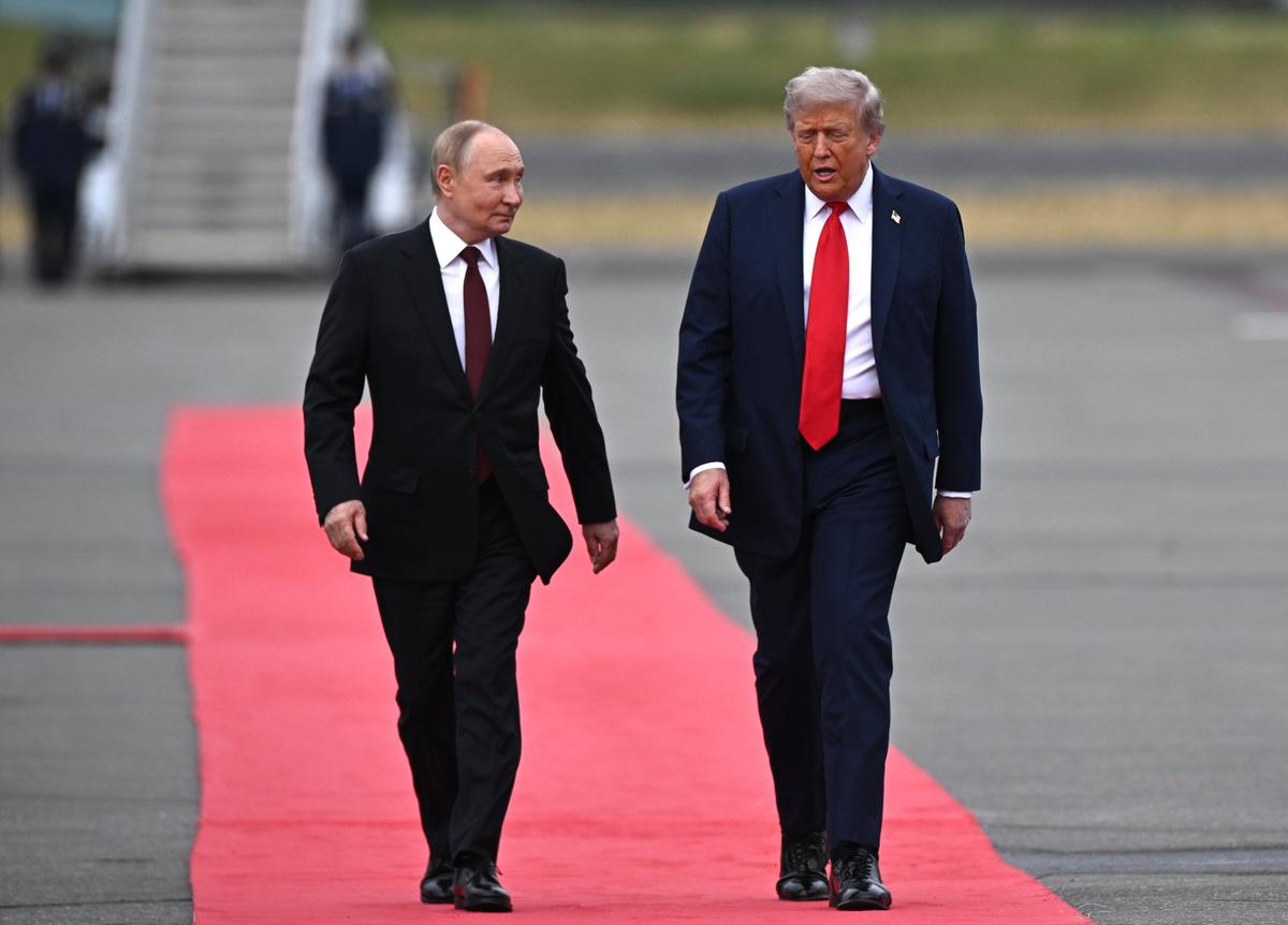 US President Donald Trump (R) welcomes Russian President Vladimir Putin, as they meet to negotiate at Joint Base Elmendorf-Richardson in Anchorage, Alaska, USA, 15 August 2025. EPA/SERGEY BOBYLEV/SPUTNIK/KREMLIN POOL MANDATORY CREDIT