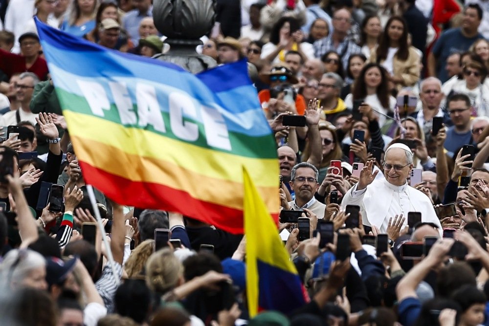 Pope Leo XIV waves from the popemobile as he arrives for the weekly General Audience in St. Peter’s Square, in Vatican City, 21 May 2025. EPA-EFE/ANGELO CARCONI
